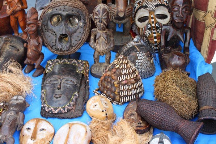 Traditional African masks at a stall in the market